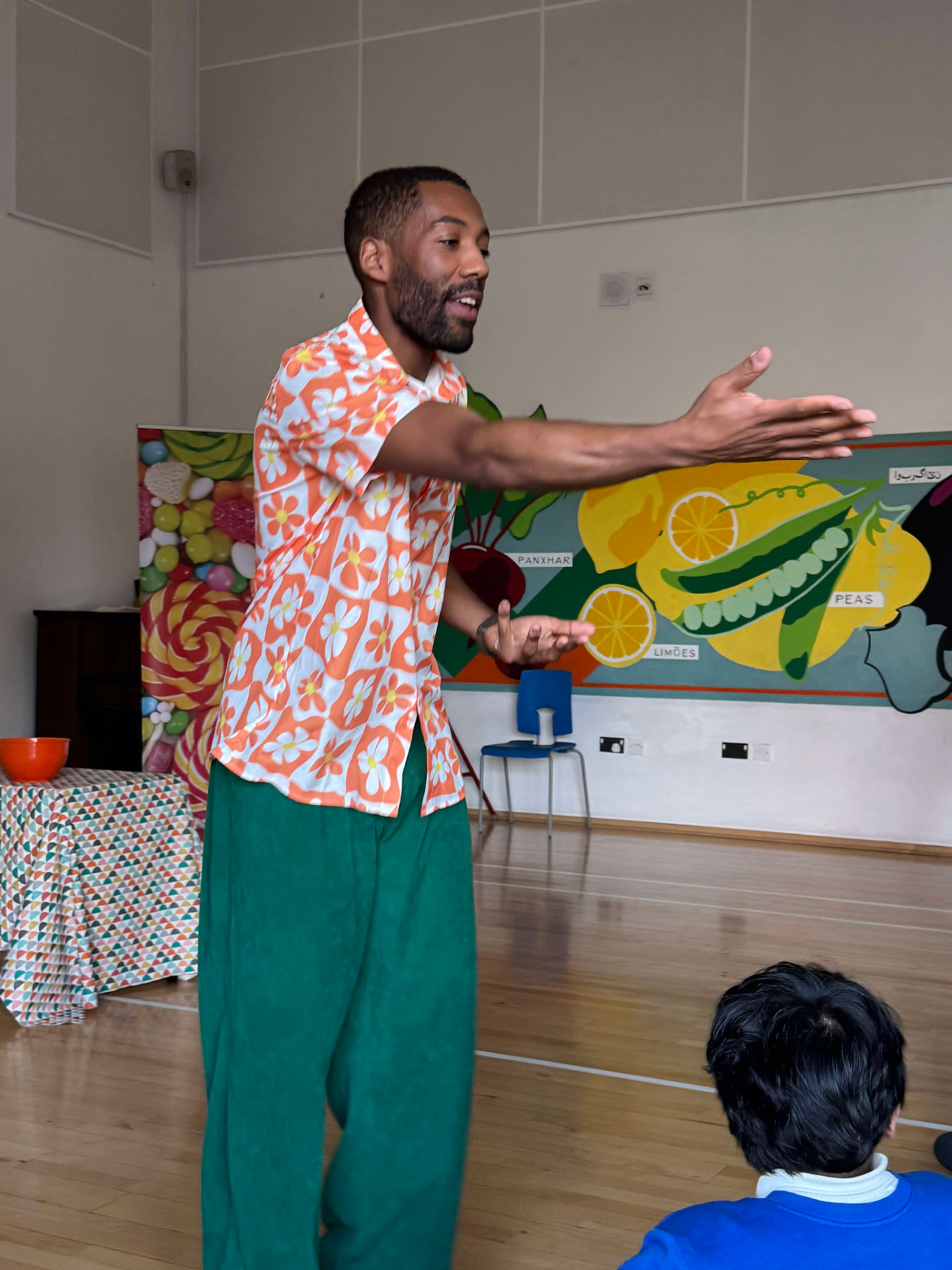 Actor addressing school pupils during a Not So Sweet performance