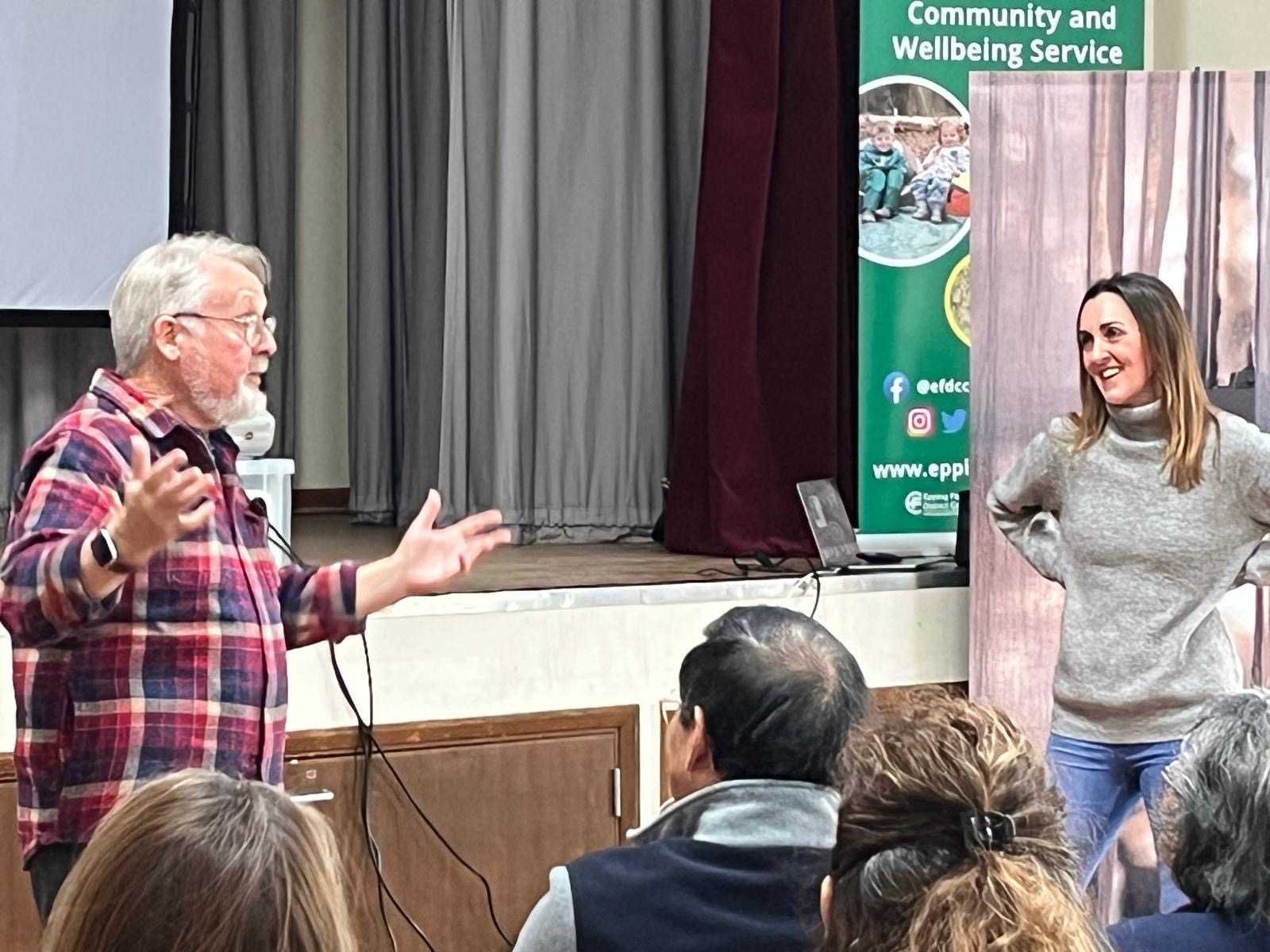 Two Secret Love actors playing a scene in front of a community audience